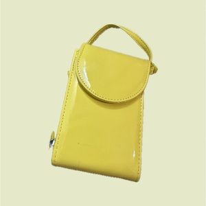 Neon yellow crossbody (clutch sized) and zipper pocket